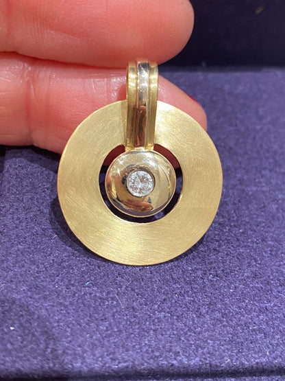 Janine Renard, Modernist two-tone gold and diamond disc pendant