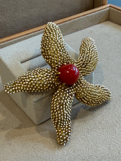BROCHE ETOILE DE MER EN OR JAUNE 18K