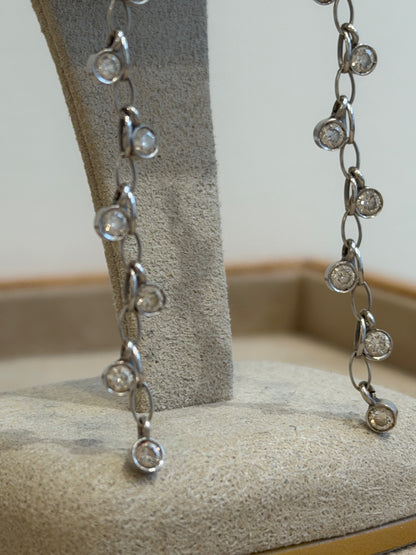 BOUCLES D'OREILLES EN OR GRIS CASCADE DE DIAMANTS