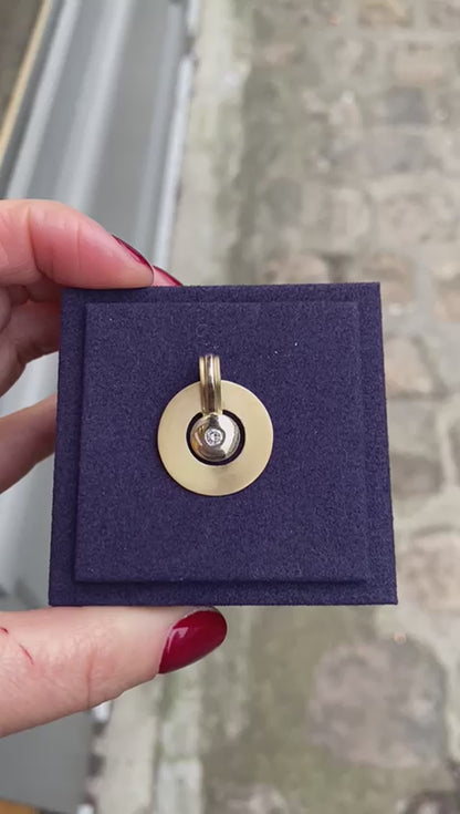 Janine Renard, Modernist two-tone gold and diamond disc pendant
